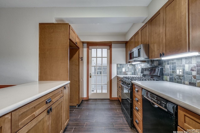 kitchen featuring light countertops, wood tiled floor, black appliances, tasteful backsplash, and brown cabinetry