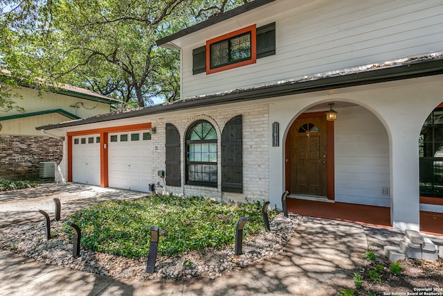 view of front of house featuring a garage and covered porch