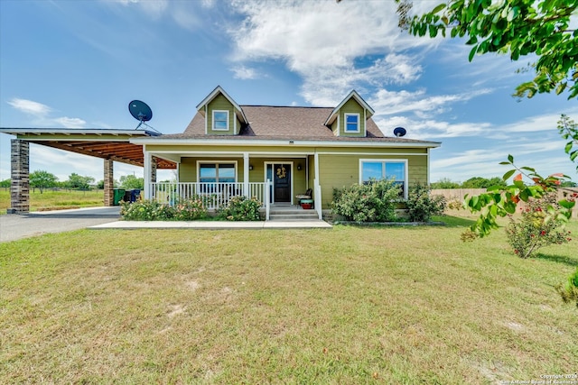 view of front of home featuring a front yard and covered porch