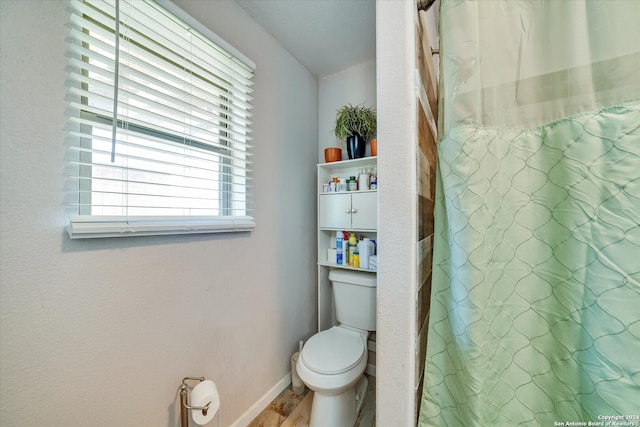 bathroom featuring toilet