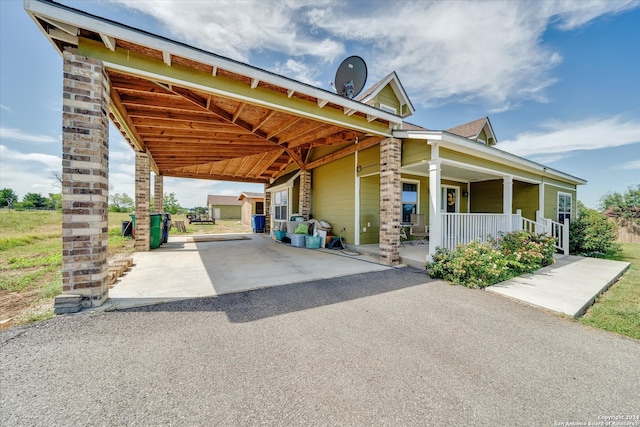 view of parking featuring a carport