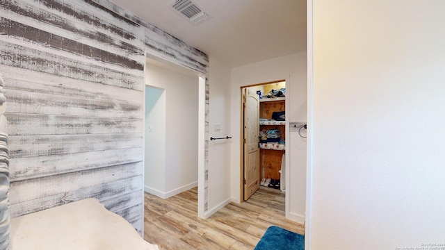 bathroom with wood-type flooring