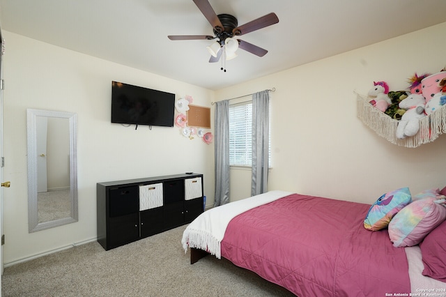 bedroom with ceiling fan and carpet flooring