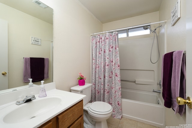 full bathroom featuring toilet, tile patterned floors, shower / tub combo, and vanity