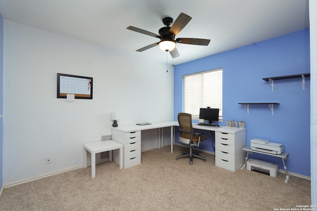 home office with ceiling fan and light colored carpet