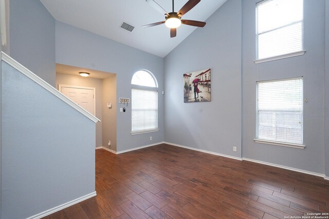 entrance foyer with ceiling fan, high vaulted ceiling, and wood-type flooring