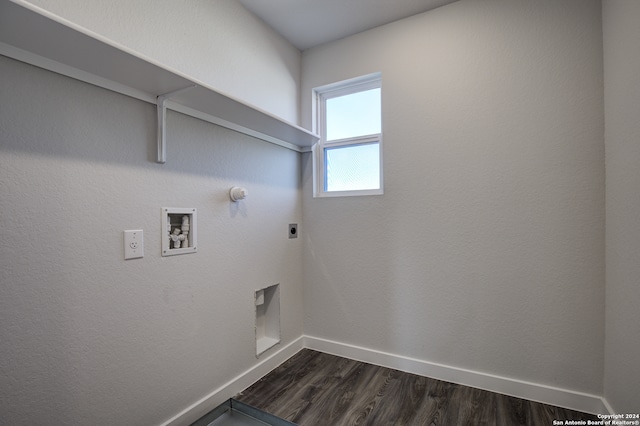 clothes washing area featuring dark wood-type flooring, washer hookup, hookup for a gas dryer, and hookup for an electric dryer