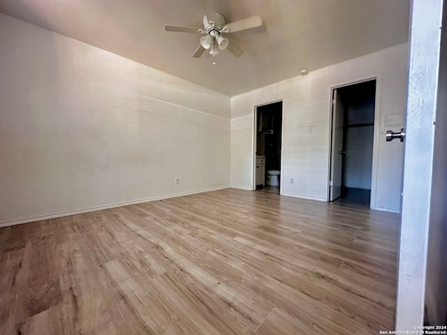 spare room featuring ceiling fan and wood-type flooring