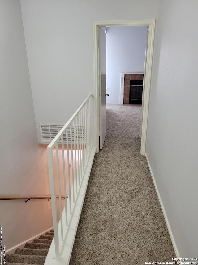 corridor featuring carpet flooring