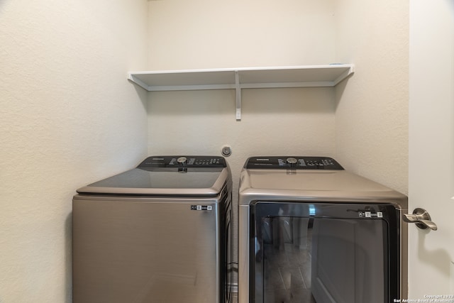 laundry room featuring separate washer and dryer