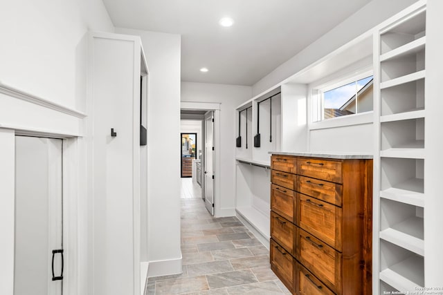 hallway with light tile patterned flooring