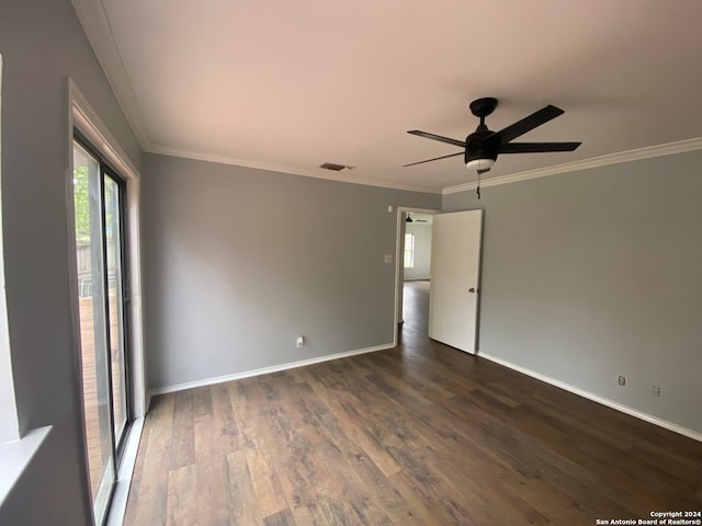 unfurnished room featuring ornamental molding, dark hardwood / wood-style floors, and ceiling fan