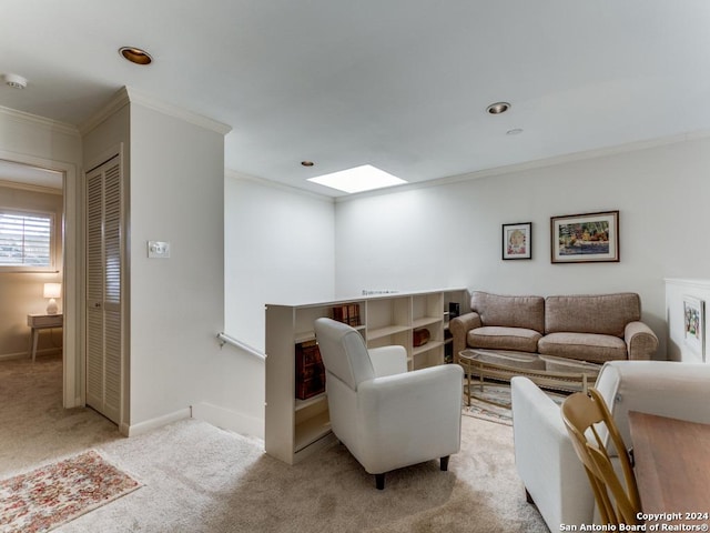 living room with recessed lighting, light carpet, a skylight, baseboards, and crown molding