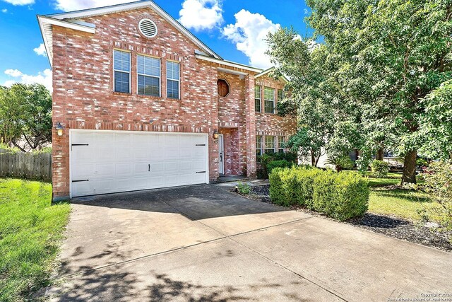 front of property with a garage