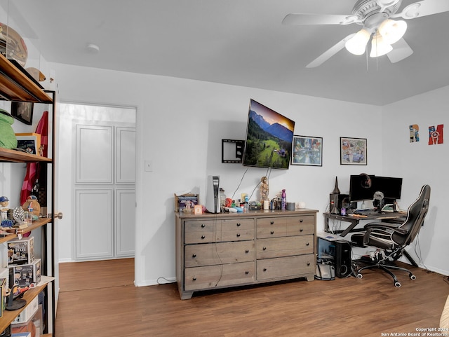 office area with ceiling fan and light wood-type flooring