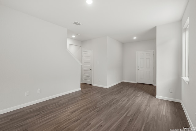 spare room featuring hardwood / wood-style flooring