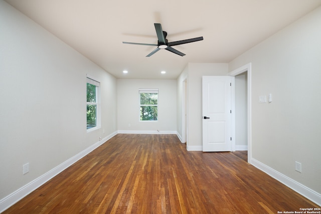 unfurnished room featuring ceiling fan and wood-type flooring