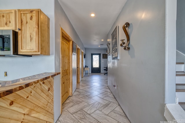 corridor featuring light parquet flooring