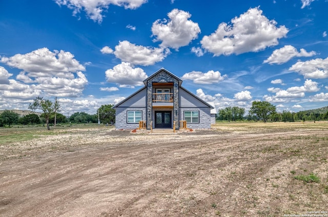 136 Cardinal Dr, Camp Wood, TX 78833 - view of front facade featuring stone siding and french doors