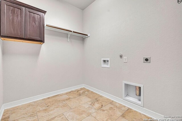 unfurnished room with ceiling fan, a raised ceiling, and wood-type flooring