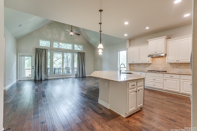 kitchen featuring white cabinetry, backsplash, high vaulted ceiling, and dark hardwood / wood-style flooring