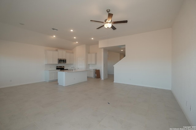 unfurnished living room featuring lofted ceiling, recessed lighting, visible vents, ceiling fan, and baseboards