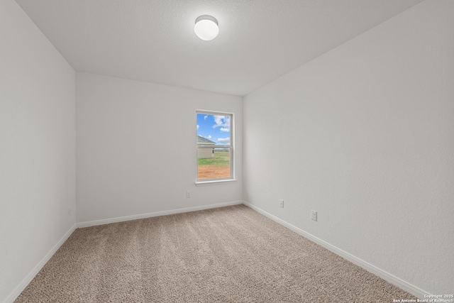 spare room with carpet flooring