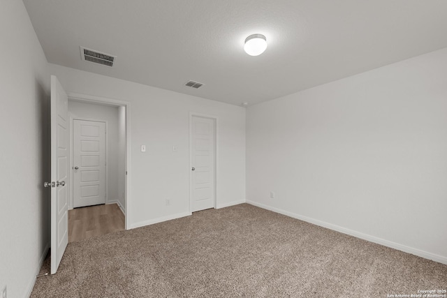 unfurnished bedroom featuring carpet floors