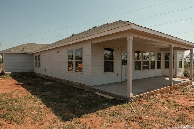 view of home's exterior with a patio