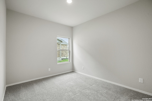 spare room with carpet flooring