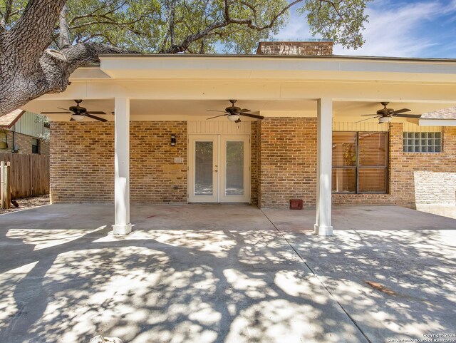 view of patio / terrace with ceiling fan and french doors