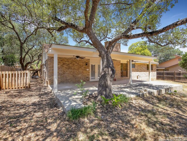 back of house featuring ceiling fan and a patio