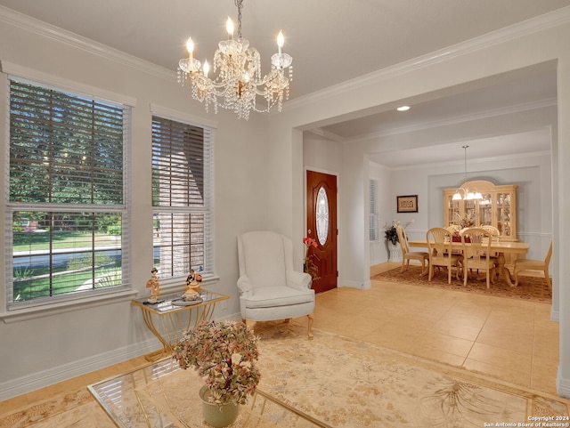 living area with a notable chandelier, ornamental molding, and light tile patterned floors