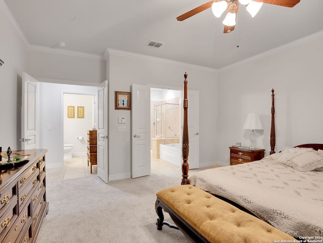 bedroom featuring ceiling fan, light carpet, ensuite bathroom, and ornamental molding