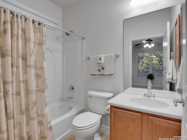 full bathroom with ceiling fan, toilet, tile patterned flooring, vanity, and shower / tub combo with curtain