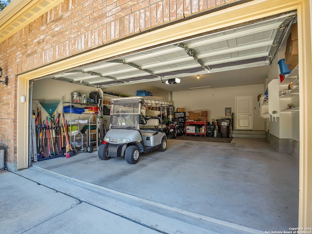 garage featuring a garage door opener