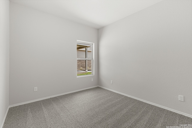 unfurnished room with carpet floors