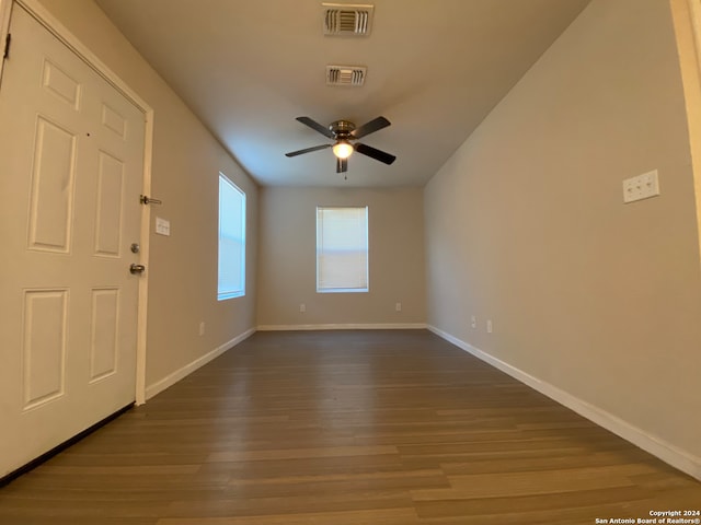 entrance foyer with ceiling fan and wood-type flooring