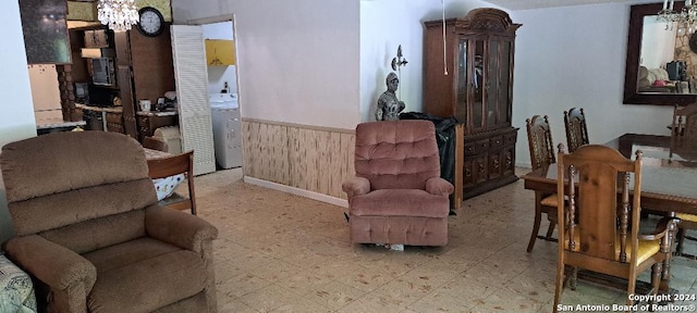 living room with a notable chandelier