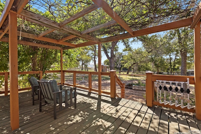 wooden terrace featuring a pergola