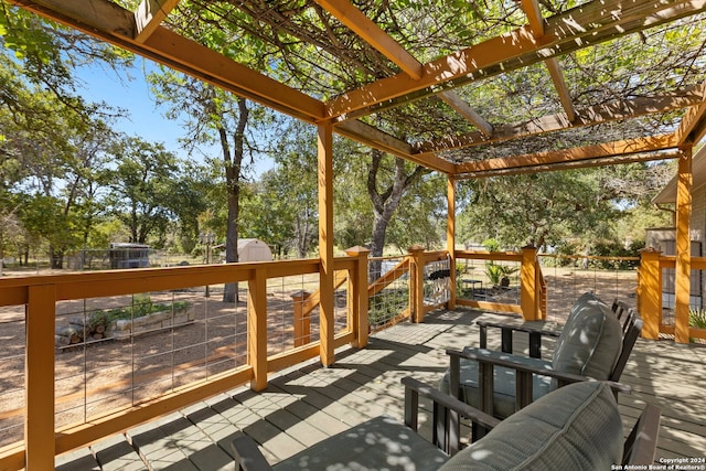 wooden terrace with a pergola