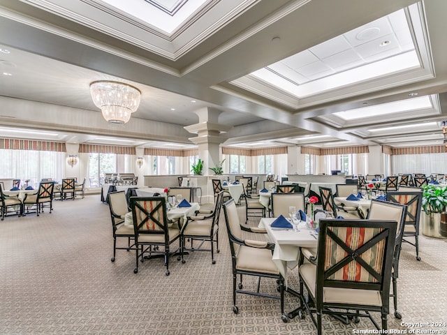 dining area featuring a notable chandelier, ornamental molding, and light colored carpet