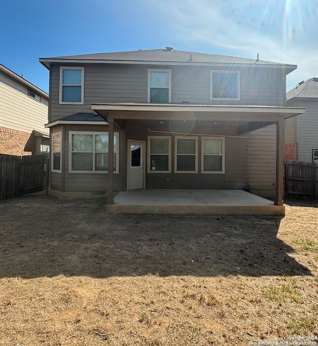 rear view of house with a patio area