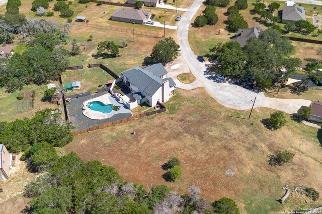 view of front of house featuring a yard and a garage