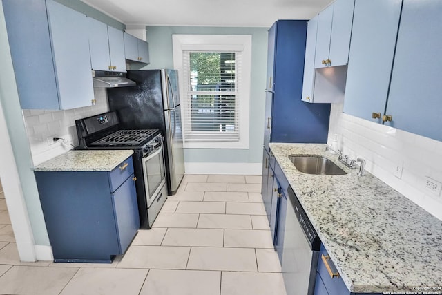 kitchen featuring stainless steel appliances, blue cabinetry, and under cabinet range hood