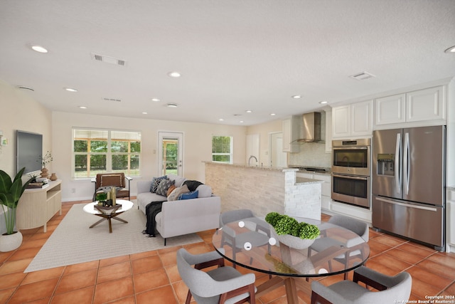 dining space with recessed lighting, visible vents, and light tile patterned floors