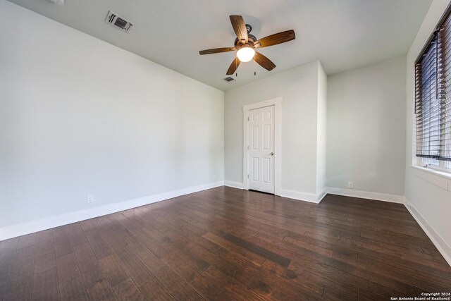 spare room featuring ceiling fan and wood-type flooring