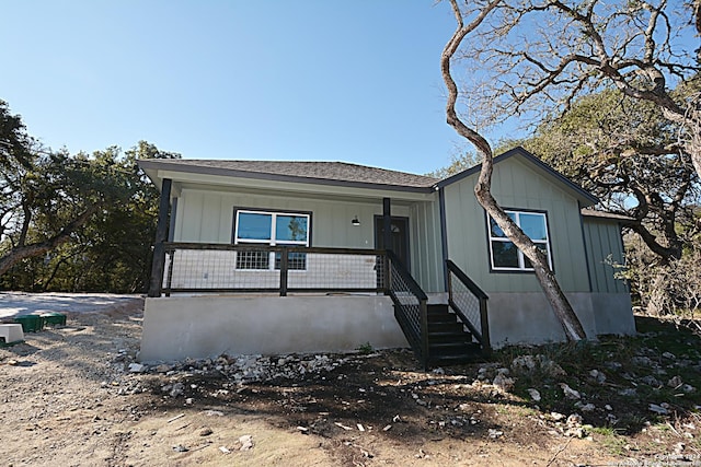 view of front facade featuring a porch and board and batten siding