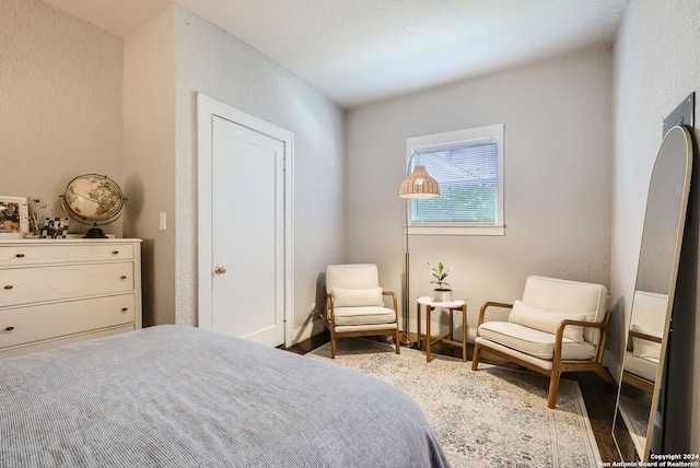 bedroom featuring hardwood / wood-style floors