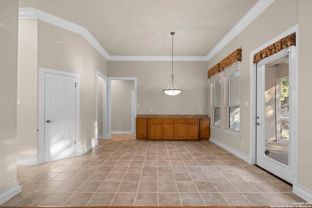 interior space with ornamental molding and light tile patterned floors